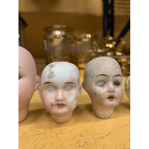 851 - FOUR VINTAGE BISQUE DOLLS HEADS TO INCLUDE ONE MARKED GERMANY WITH THE NUMBER 395 A.100 M, A CEUS, G... 