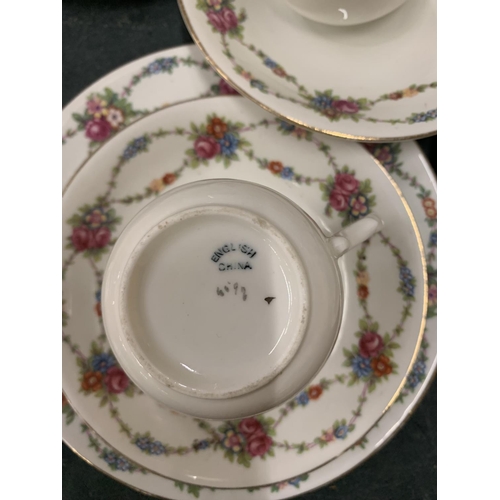 898 - A VINTAGE ENGLISH CHINA LARGE QUANTITY OF TEAWARE TO INCLUDE CUPS, SAUCERS, SIDE PLATES, CREAM JUG A... 