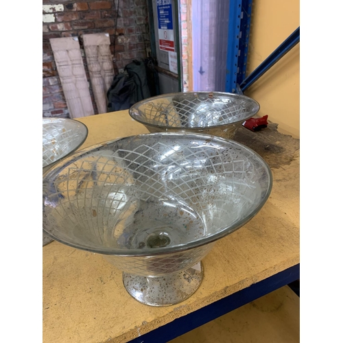 918 - THREE LARGE GLASS FOOTED BOWLS