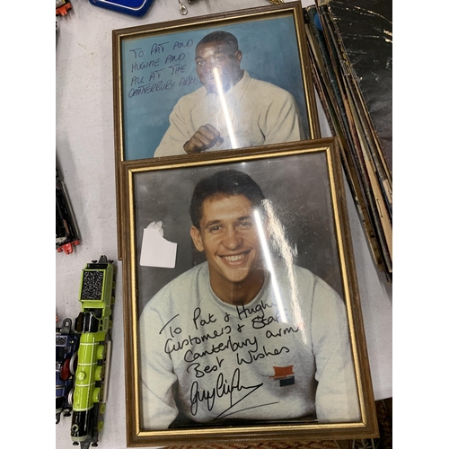 922 - TWO FRAMED SIGNED PHOTOGRAPHS OF GARY LINEKER AND FRANK BRUNO