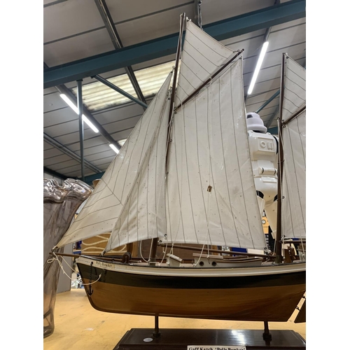 947 - A WOODEN MODEL OF A SAILING BOAT CALLED 'POLLY BOWKER' LENGTH 68CM