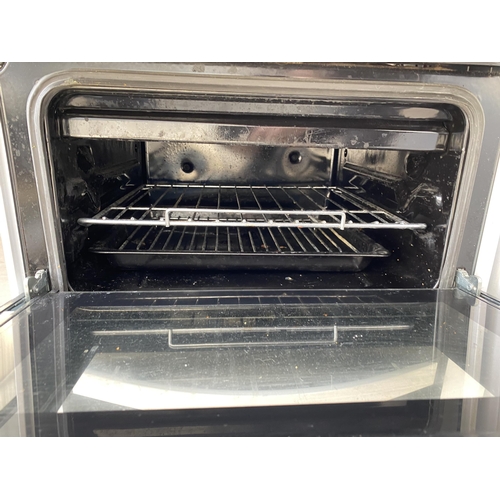 2063A - A WHITE ELECTRIC OVEN AND HOB