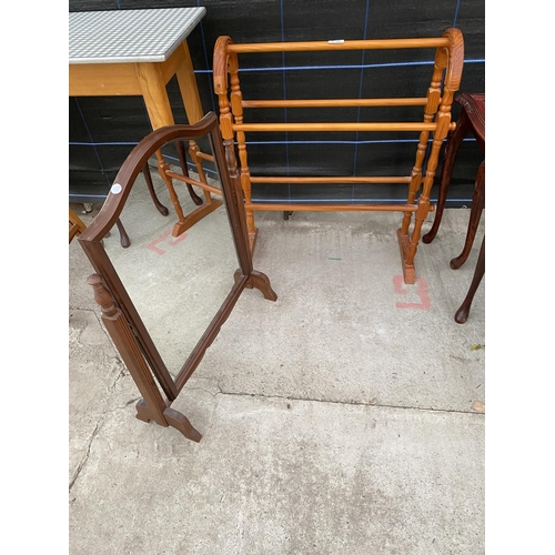 2742 - A MODERN FIVE BAR TOWEL RAIL AND A SWING FRAME MIRROR