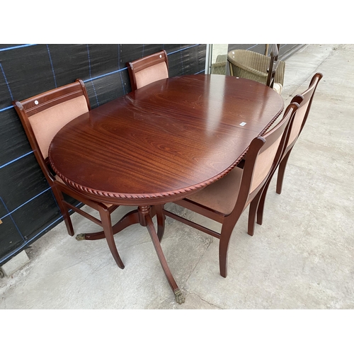 2751 - A REGENCY STYLE EXTENDING DINING TABLE AND FOUR CHAIRS