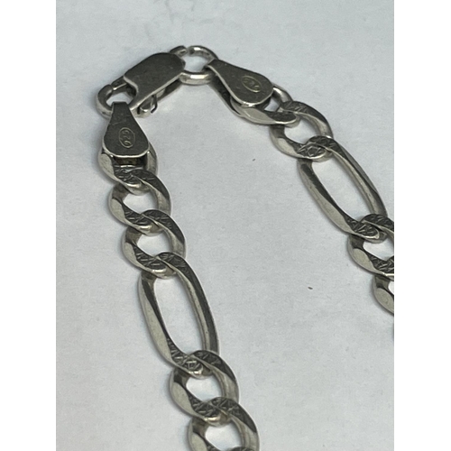 713 - A MARKED SILVER FIGARO NECKLACE LENGTH 20 INCHES