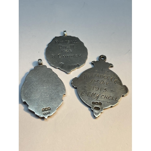 714 - THREE HALLMARKED SILVER WATCH CHAIN FOBS