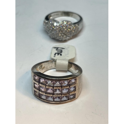 722 - FOUR VARIOUS SILVER RINGS WITH STONES