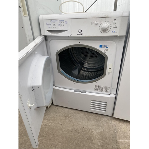 2053 - A WHITE INDESIT 8KG CONDENSER DRYER BELIEVED IN WORKING ORDER BUT NO WARRANTY