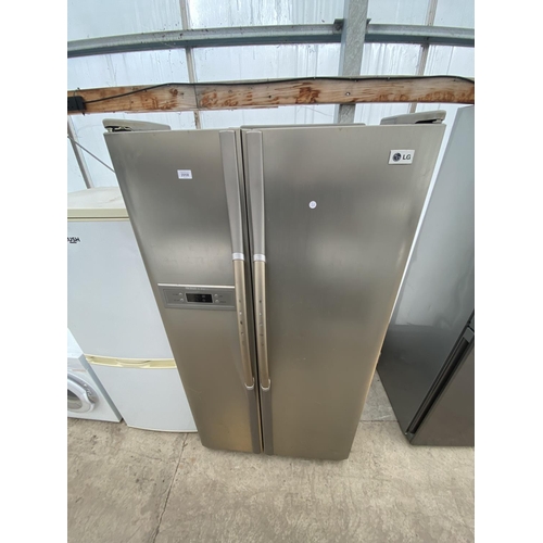 2058 - A SILVER LG AMERICAN STYLE FRIDGE FREEZER