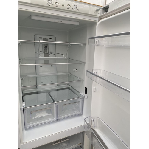 2060 - A WHITE HOTPOINT UPRIGHT FRIDGE FREEZER