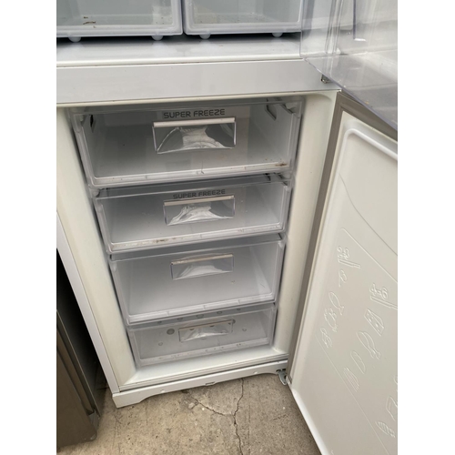 2060 - A WHITE HOTPOINT UPRIGHT FRIDGE FREEZER