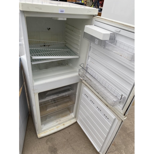 2065 - A WHITE PROLINR UPRIGHT FRIDGE FREEZER