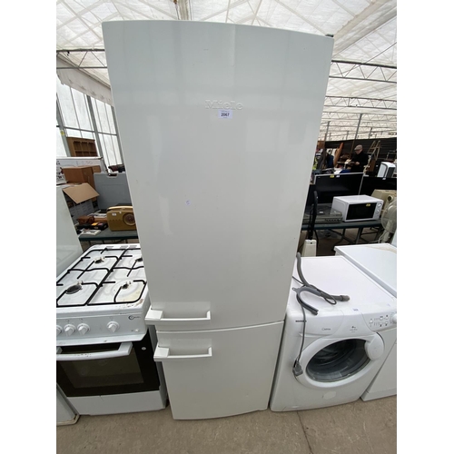 2067 - A WHITE MIELE UPRIGHT FRIDGE FREEZER