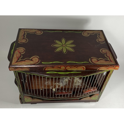 24 - A VINTAGE HAND PAINTED WOODEN BIRD CAGE, 28 X 38 X 22CM