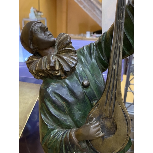 62 - A COLD PAINTED BRONZE FIGURE OF A JESTER PLAYING A MUSICAL INSTRUMENT, HEIGHT 43CM