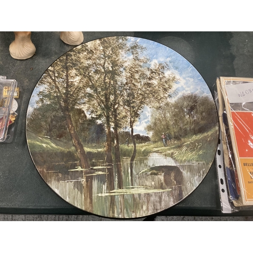 188 - TWO ITEMS - A HANDPAINTED SIGNED CHARGER OF A RIVER SCENE DIAMETER TOGETHER WITH A HANDPAINTED BOWL ... 