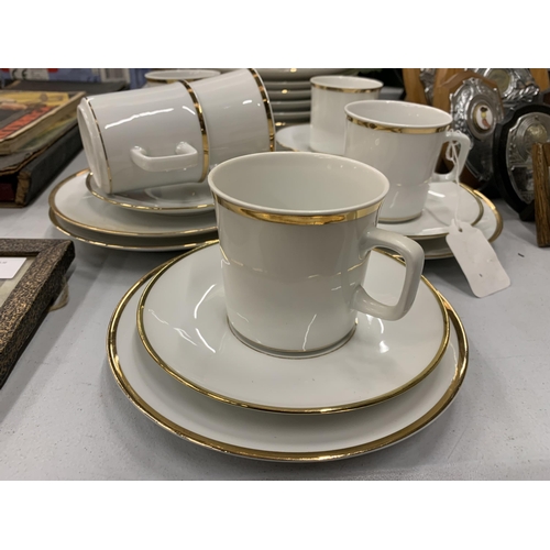 215 - AN ESCHENBACH GERMAN PART DINNER SERVICE TO INCLUDE VARIOUS SIZED PLATES, BOWLS, CUPS, SAUCERS, ETC