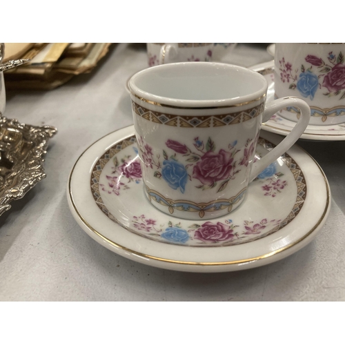 298 - A QUANTITY OF CHINA CUPS AND SAUCERS PLUS A SUGAR BOWL