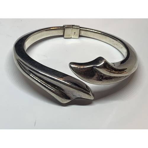 571 - A DESIGNER SILVER BANGLE MARKED ACE