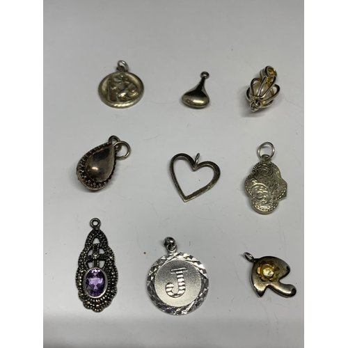 616 - SEVENTEEN ASSORTED SILVER PENDANTS