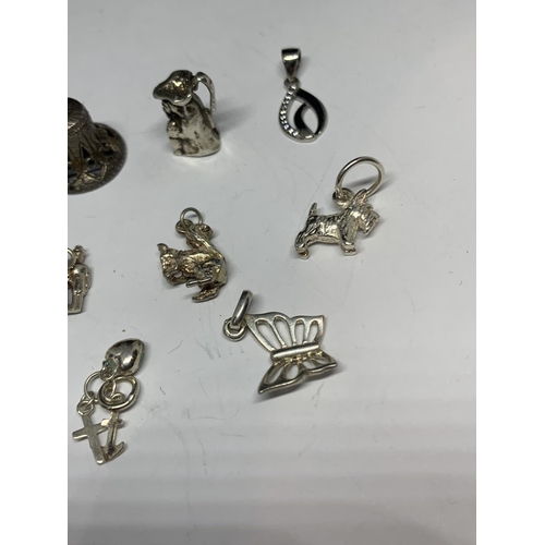 617 - ELEVEN ASSORTED SILVER CHARMS