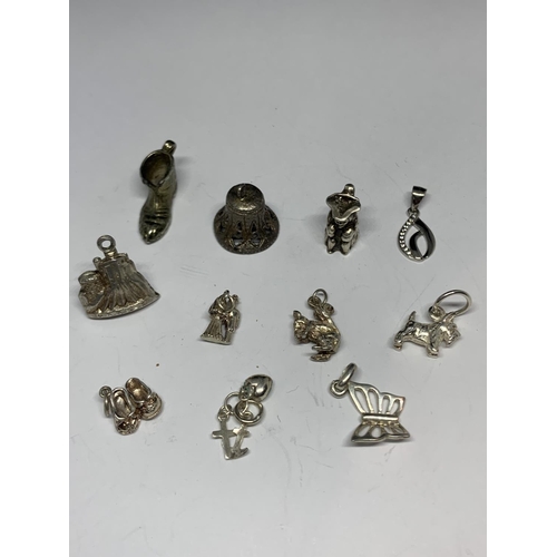 617 - ELEVEN ASSORTED SILVER CHARMS