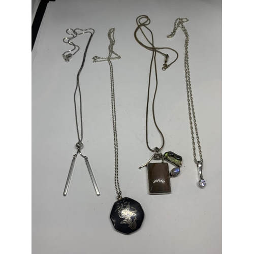 626 - FOUR SILVER NECKLACES WITH PENDANTS