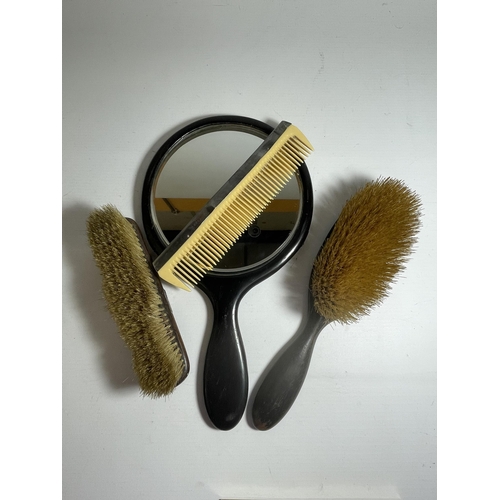 649 - A EBONY AND HALLMARKED SILVER BRUSH, MIRROR, CLOTHES BRUSH AND COMB SET