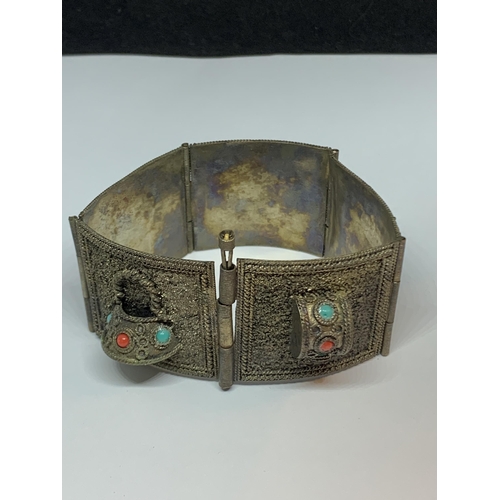 677 - AN ORNATE ASIAN SILVER BRACELET