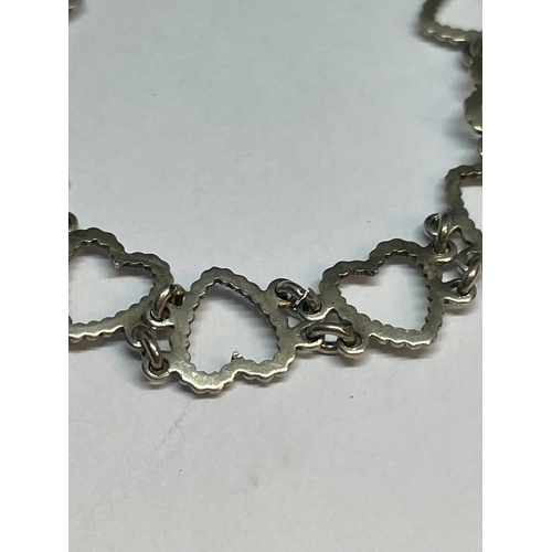 719 - TWO SILVER HEART BRACELETS IN A PRESENTATION BOX