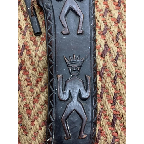 842 - AN AFRICAN STYLE CARVED KNIFE SHEATH WITH KNIFE - A/F