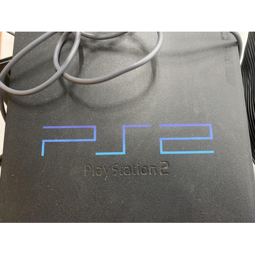 844 - A SONY PLAYSTATION 2 WITH MICROSOFT MOUSE