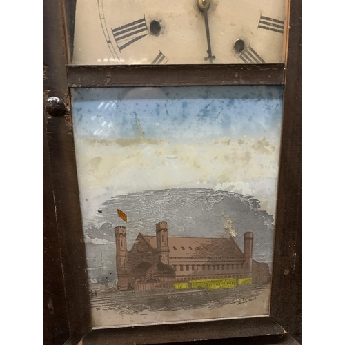 953 - A VINTAGE JEROME & CO WALL CLOCK IN NEED OF RESTORATION