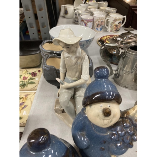 1014 - A QUANTITY OF CERAMICS TO INCLUDE A CASCADES FIGURE OF A FISHERMAN, SNOWMEN, PLANTERS, ETC.,