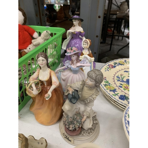 1198A - NINE VARIOUS LADY FIGURINES