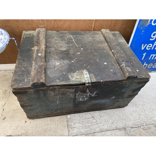 1315 - A LARGE VINTAGE WOODEN CHEST WITH METAL BANDING