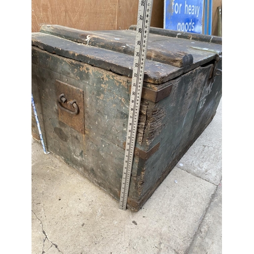 1315 - A LARGE VINTAGE WOODEN CHEST WITH METAL BANDING