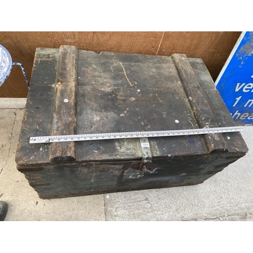 1315 - A LARGE VINTAGE WOODEN CHEST WITH METAL BANDING