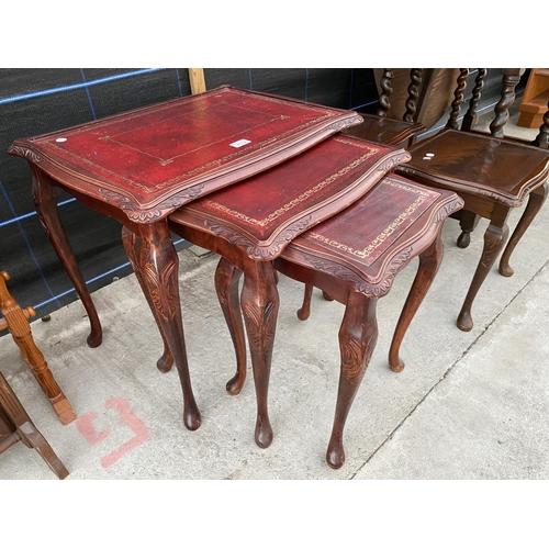 2743 - A NEST OF THREE TABLES AND A PAIR OF LAMP TABLES