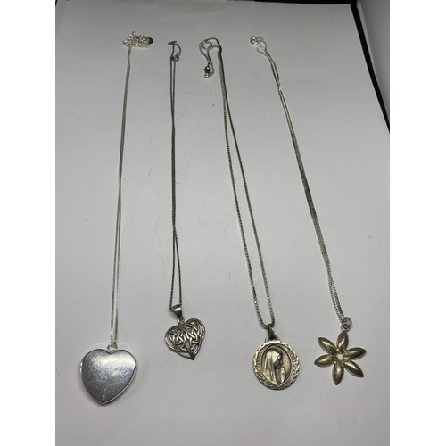 547 - FOUR SILVER NECKLACES WITH PENDANTS