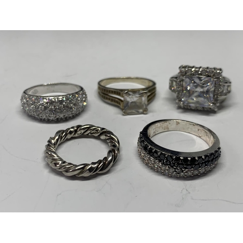 550 - FIVE VARIOUS SILVER RINGS