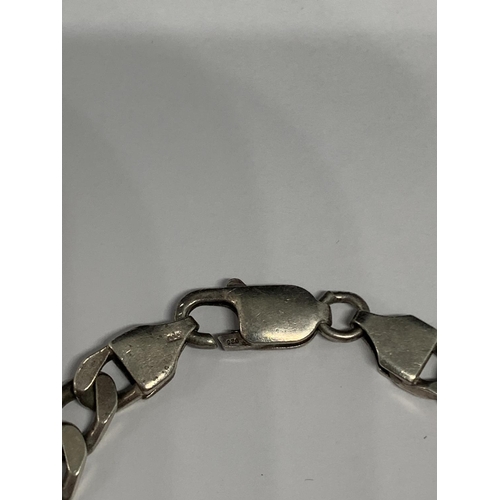 552 - A HEAVY SILVER FLAT LINK BRACELET