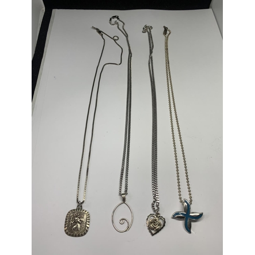 556 - FOUR SILVER NECKLACES WITH PENDANTS