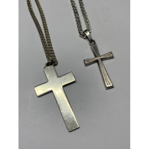 572 - TWO SILVER NECKLACES WITH CROSS PENDANTS