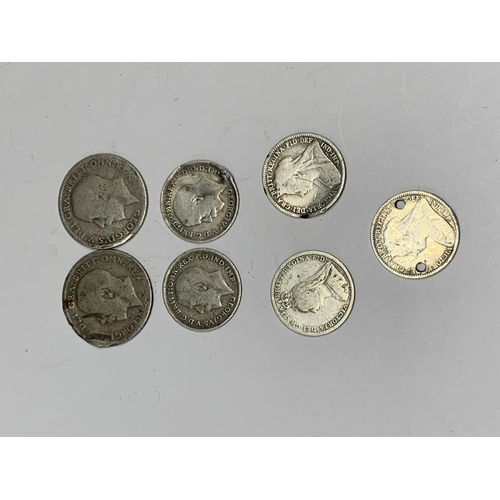 578 - SEVEN SILVER COINS TO INCLUDE THREE PENCES AND SIX PENCES