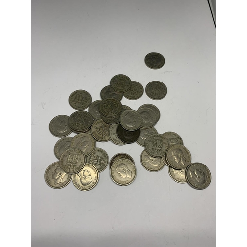 579 - A QUANTITY OF SILVER SIXPENCES