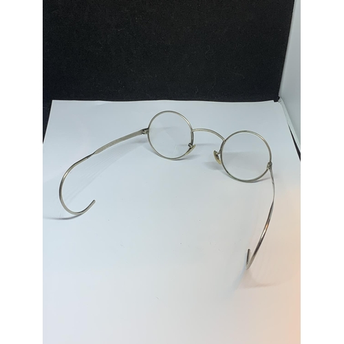 589 - A PAIR OF ALGHA SAVILLE ROW LONDON SPECTACLES