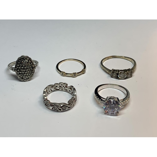 593 - FIVE VARIOUS SILVER RINGS