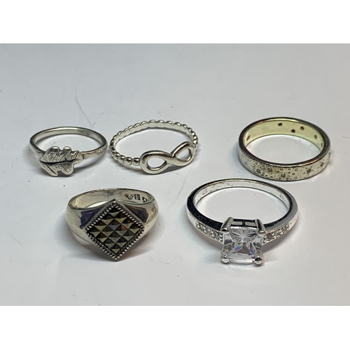 600 - FIVE VARIOUS SILVER RINGS