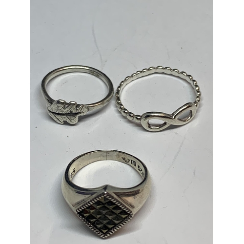 600 - FIVE VARIOUS SILVER RINGS